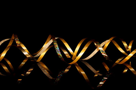 beautiful festive background, golden serpentine on a black backgroundの写真素材
