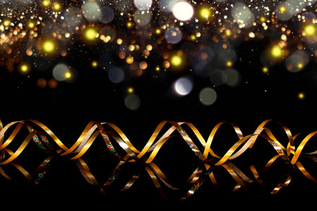 beautiful festive background, golden serpentine on a black backgroundの写真素材
