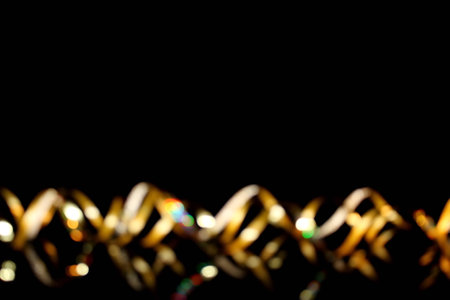 beautiful abstract golden background on black backgroundの写真素材