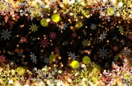beautiful Christmas background with colorful snowflakes on a shiny backgroundの写真素材