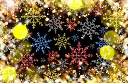 beautiful Christmas background with colorful snowflakes on a shiny backgroundの写真素材