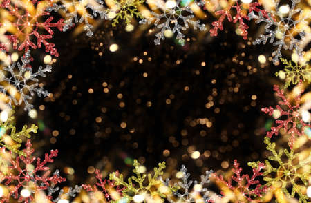 beautiful Christmas background with colorful snowflakes on a shiny backgroundの写真素材
