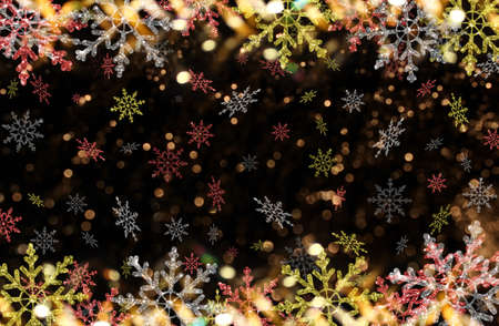 beautiful Christmas background with colorful snowflakes on a shiny backgroundの写真素材