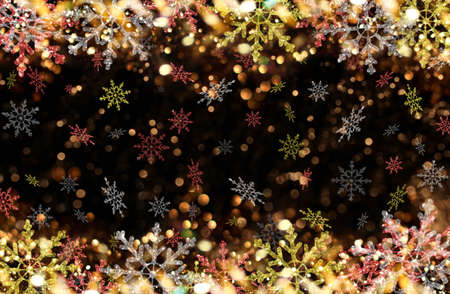 beautiful Christmas background with colorful snowflakes on a shiny backgroundの写真素材