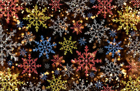 beautiful Christmas background with colorful snowflakes on a shiny backgroundの写真素材