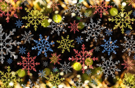 beautiful Christmas background with colorful snowflakes on a shiny backgroundの写真素材