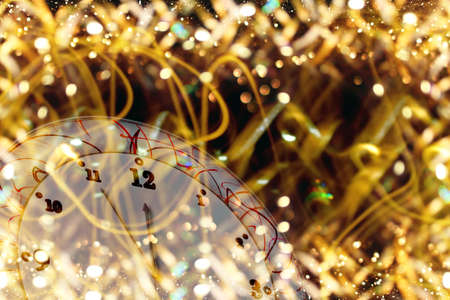 beautiful Christmas background with a clock on a shiny backgroundの写真素材
