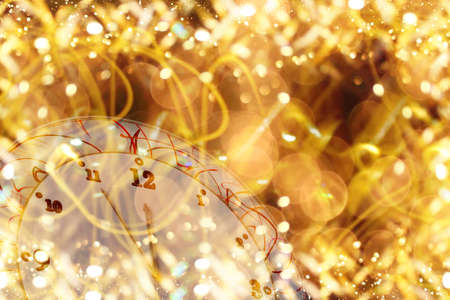 beautiful Christmas background with a clock on a shiny backgroundの写真素材