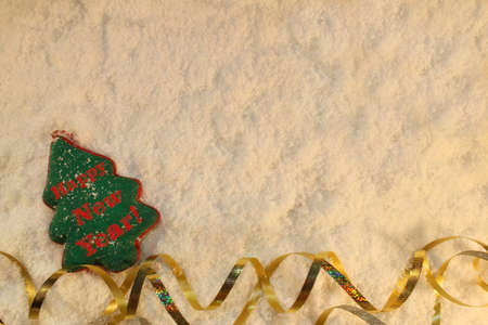 beautiful green Christmas tree lies on the white snowの写真素材