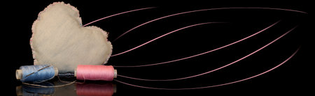 beautiful heart made of denim fabric on a black background with the inscription Happy Valentine's...