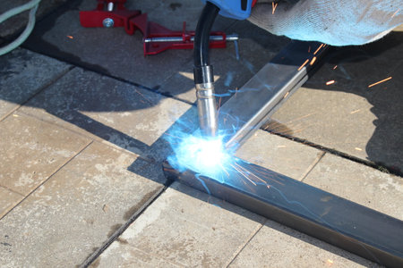 repair work with metal using a welding machineの写真素材