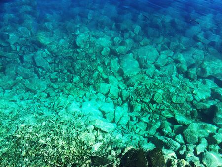 Rocks through the Atlantic Ocean water clarity in the harbor ? ?? Lanzarote - Canary Islandの写真素材