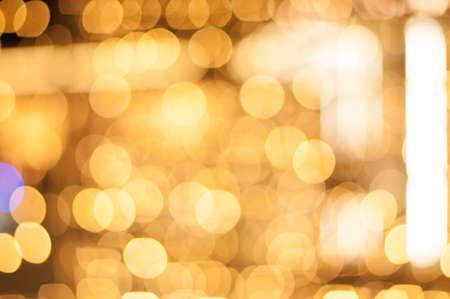 Holiday lights on a city streets on december night. Holiday background. Selective focus.の写真素材