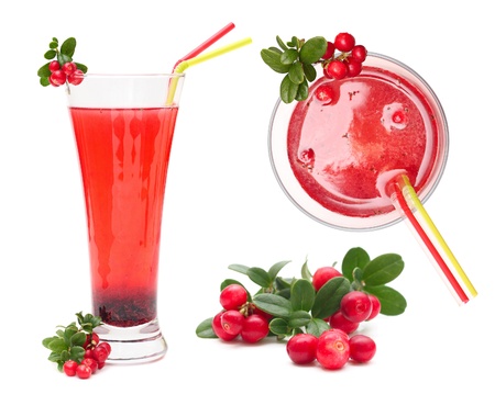 Berry juice and cowberry with leaves isolated on whiteの写真素材