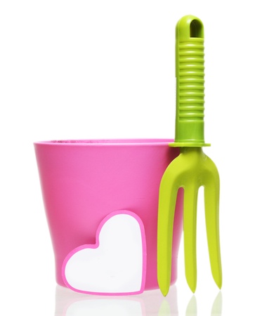 Flowerpot and garden tool on white.の写真素材