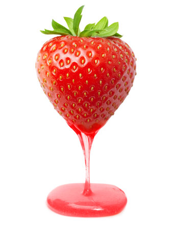 Red berry strawberry with caramel  isolated on white backgroundの写真素材