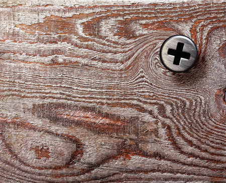 Brown wood texture background with screw, bolt, natural patterns.の写真素材