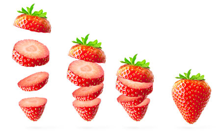 Falling strawberry isolated on whiteの写真素材