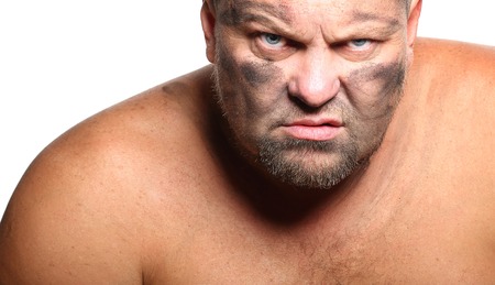 Face of an angry, wicked man, bearded manの写真素材