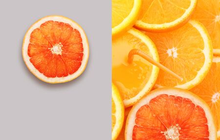 Stack of orange fruit and grapefruit sliceの写真素材