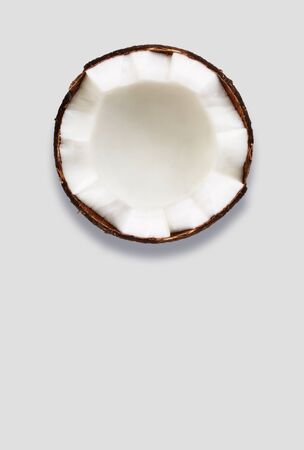 Tropical fruit coconut on gray