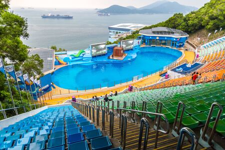 Spectator colorful seats in dolphinarium Ocean park. Hong Kong, China. July 2018のeditorial素材
