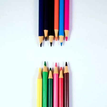 Different color wooden pencils on white background.の写真素材