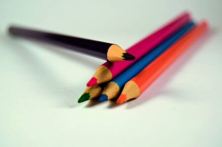 Different color wooden pencils on white background.の写真素材