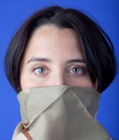 Beautiful woman wearing camouflage bandanaの写真素材