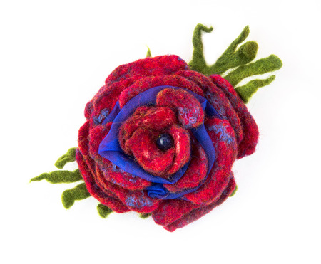 Brooch made of felt wool on a white backgroundの写真素材