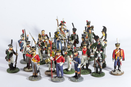Group of toy soldiers on a plain whiteの写真素材