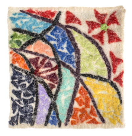 The mat of felted wool with an abstract patternの写真素材