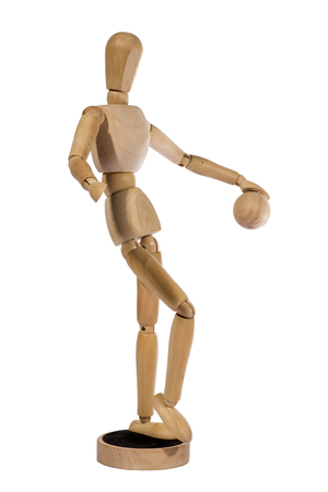 Wooden figurine man hinged on a white backgroundの写真素材
