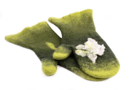 Mittens from felted wool on a white backgroundの写真素材