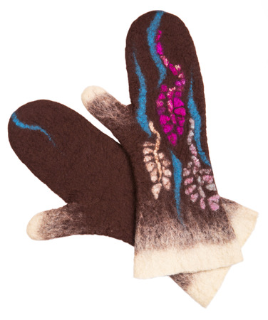 Mittens from felted wool on a white backgroundの写真素材