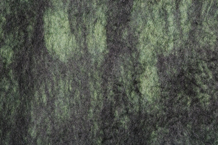 Background from natural merino wool felted closeupの写真素材