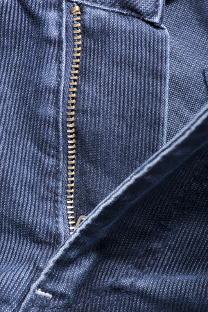 A fragment of denim corduroy trousers closeupの写真素材
