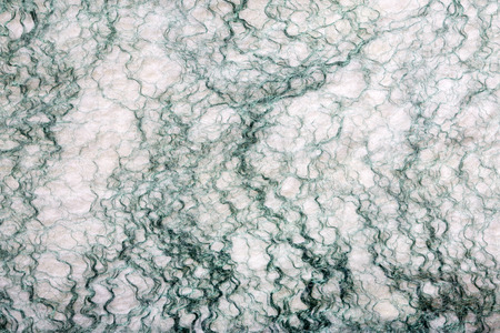 Background from natural merino wool felted closeupの写真素材