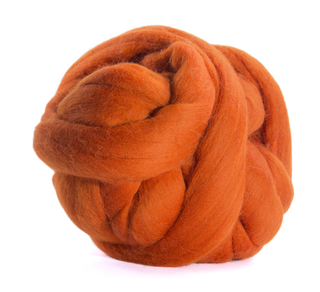 Hank merino wool orange on a white backgroundの写真素材