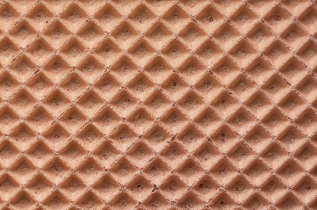 Background and texture of the surface of the wafer confectionery pinkの写真素材