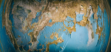 An old wall resembling the planet Earthの写真素材