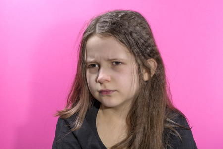 Portrait of the offended and frustrated girlの写真素材