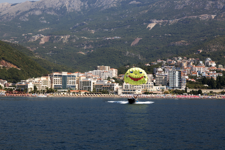 View from the sea to the village of Becici. Budva, Montenegro.のeditorial素材