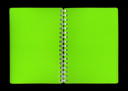 Cover of a green notebook on a black background