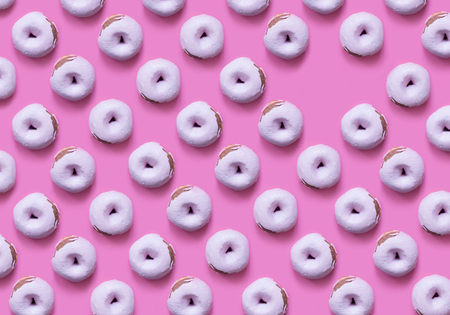 Collage and background of donuts covered with sweet glaze on a pink background