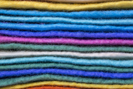 Background of woolen products natural merino wool close Upの写真素材