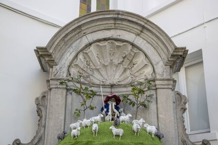 Brussels, Belgium - July 04, 2018: Manneken Pis is dressed in costume shepherd sheepのeditorial素材
