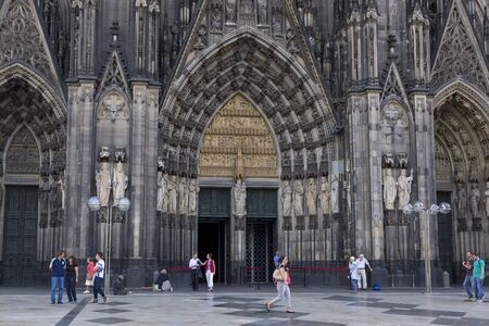 Cologne, Germany - July 07, 2018: Main entrance to the Cathedral Church of Saint Peter, Catholic cathedral in Cologneのeditorial素材