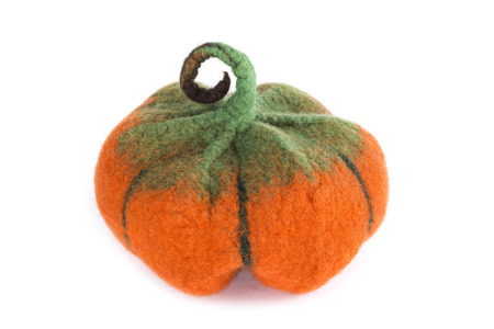 Pumpkin handmade from felted wool for celebration of Halloweenの写真素材