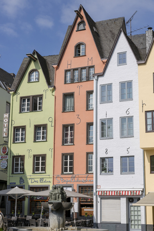 Cologne, Germany - July 07, 2018: Fountain "Fish shops" against a backdrop of beautiful houses in the center of Cologneのeditorial素材